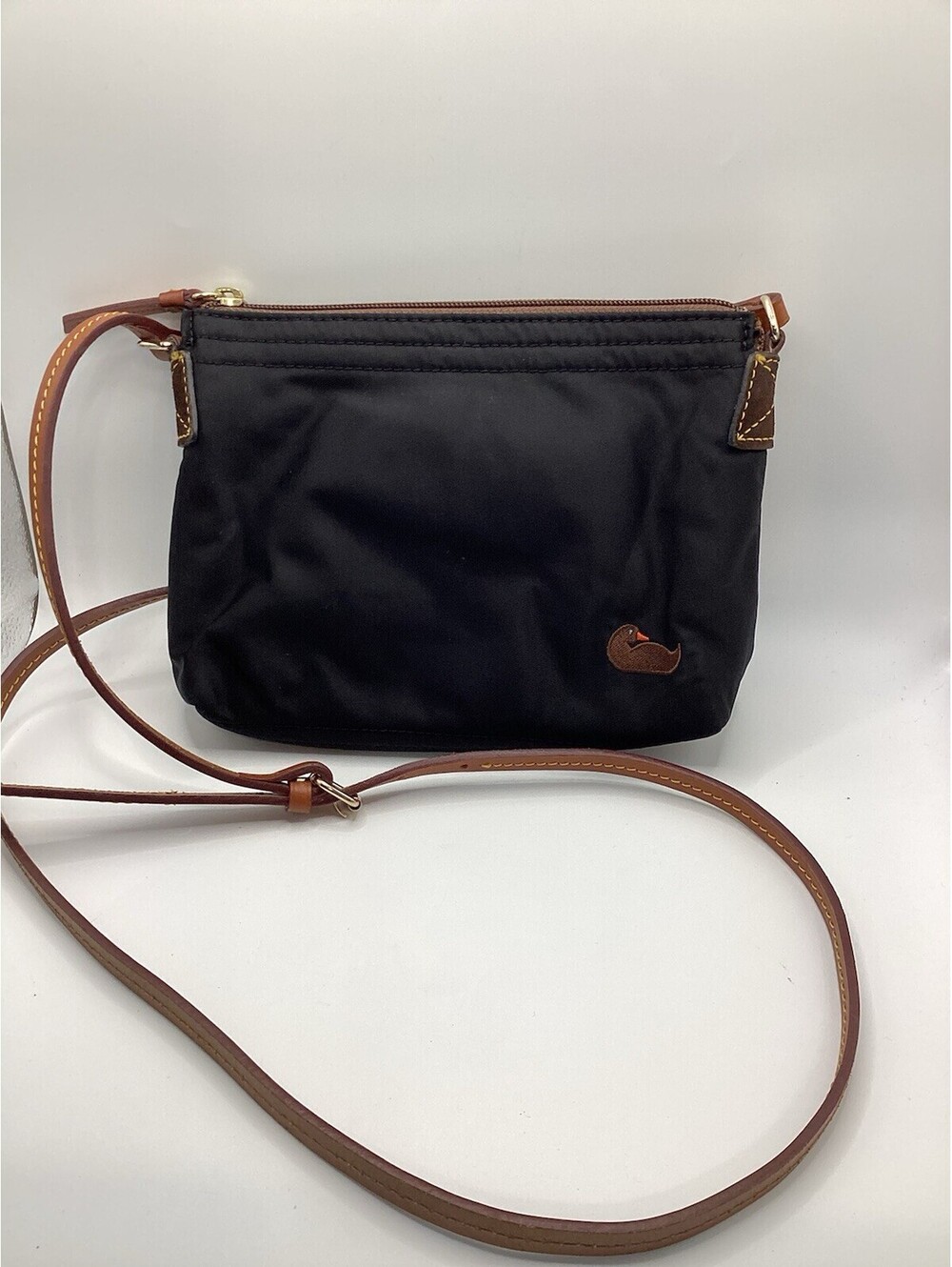 Dooney & Bourke Black Nylon Crossbody With Brown Leather Trim